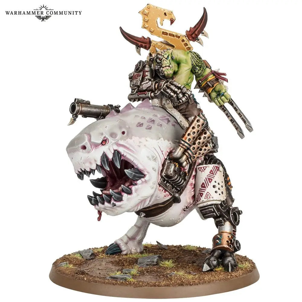 Painted miniature of an Ork riding a Squigosaur from Warhammer Orks Mozrog Skragbad