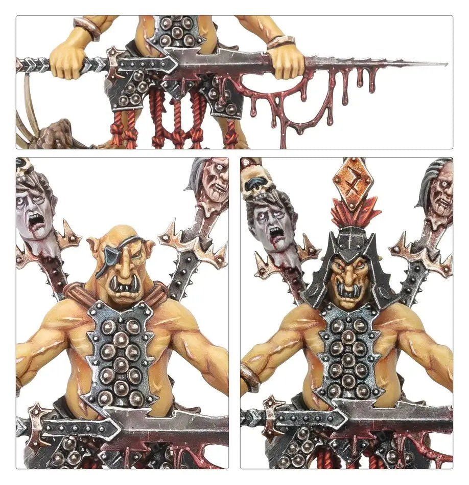 Miniature Orc figures with weapons and severed heads from Warhammer Orruk Warclans Hobgrot Slittaboss