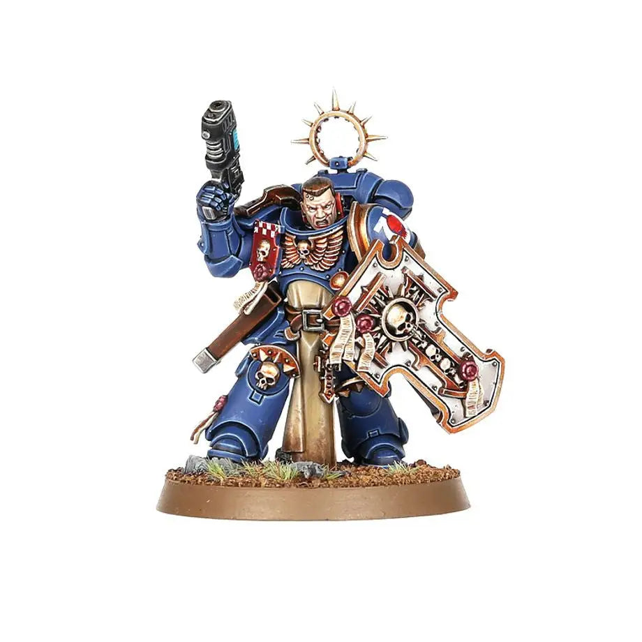 Painted miniature of Blue Armored Space Marines Bladeguard Veterans with shield and pistol