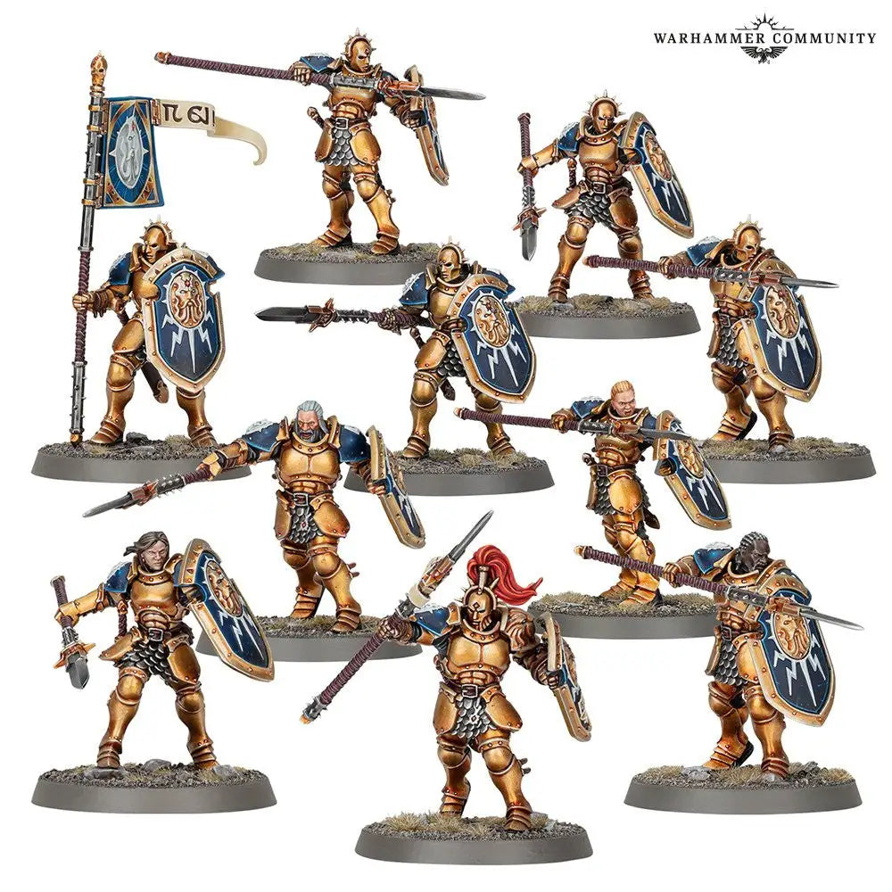 Miniature fantasy warrior figurines in gold armor from Warhammer: Stormcast Eternals Vindictors