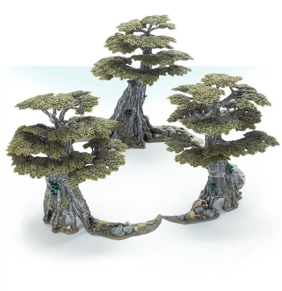 Miniature trees with textured trunks and green foliage from Warhammer Sylvaneth Awakened Wyldwood