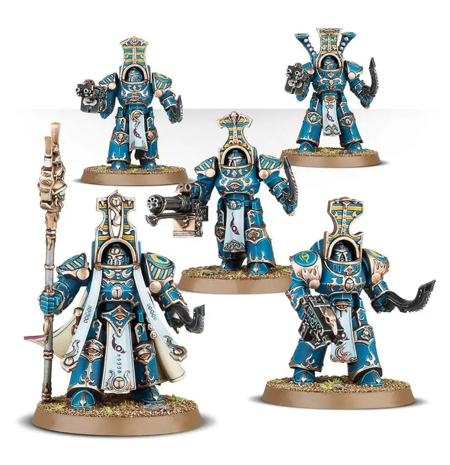 Highly detailed blue and gold Warhammer Scarab Occult Terminators miniature figures
