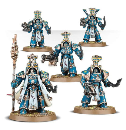 Highly detailed blue and gold Warhammer Scarab Occult Terminators miniature figures