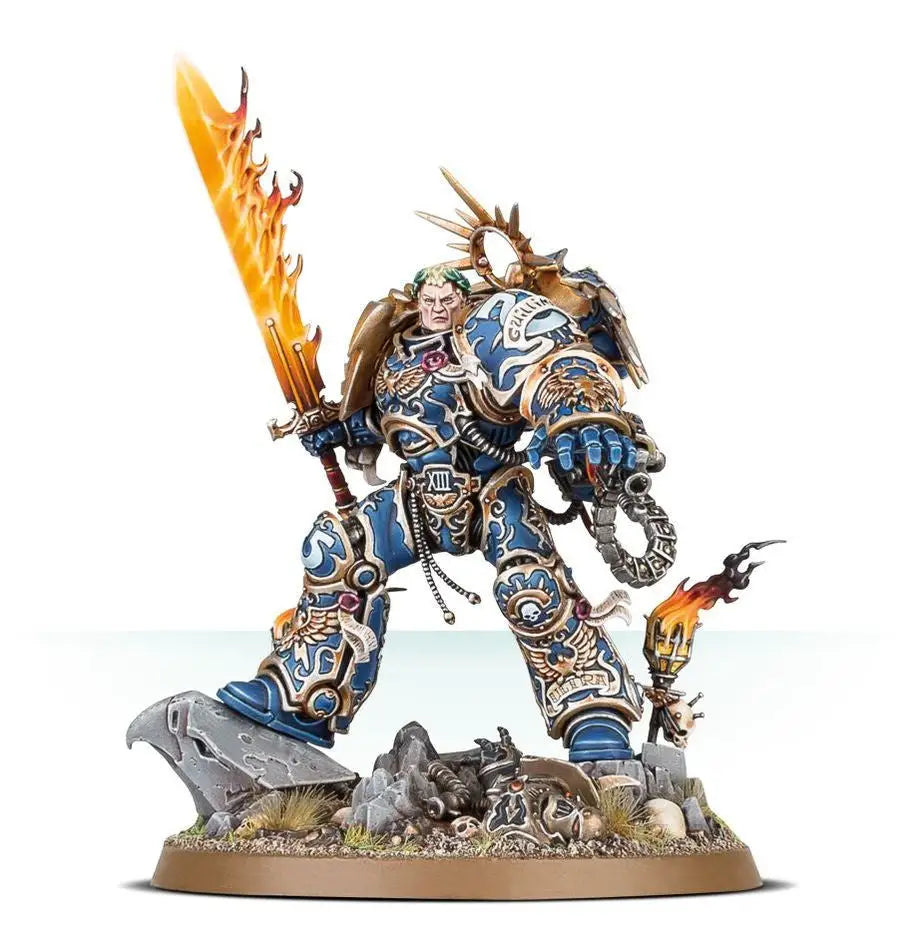Miniature of Roboute Guilliman in blue and gold power armor with flaming sword
