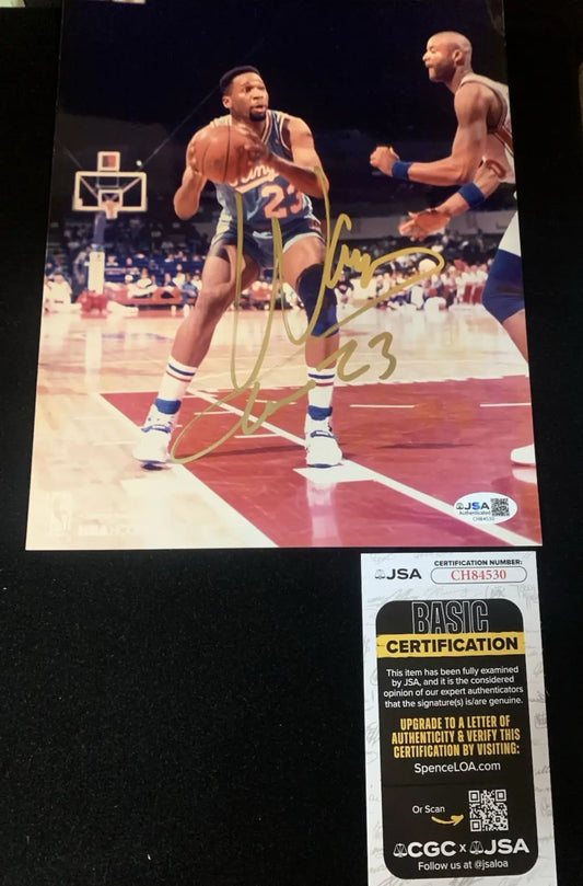 Autographed Wayman Tisdale Sacramento Kings photo with certification sticker and basketball
