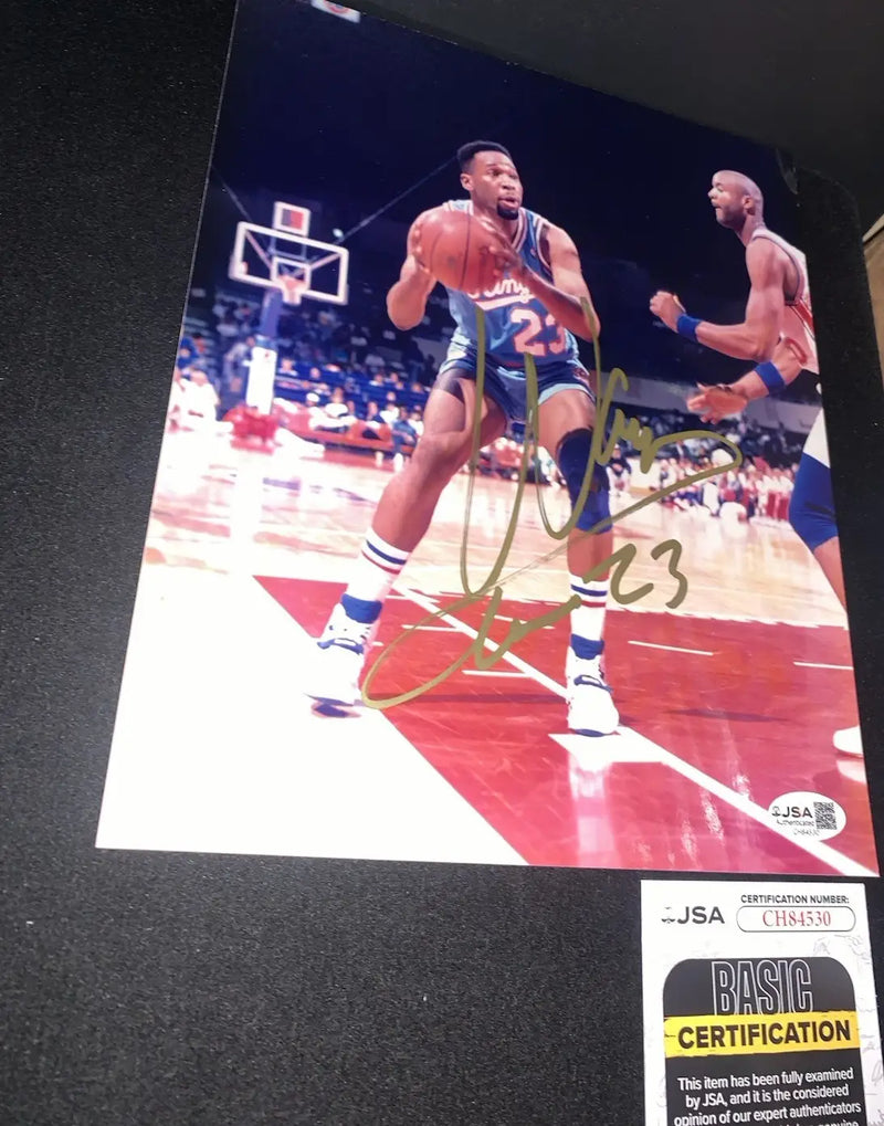 Autographed photo of Wayman Tisdale in Sacramento Kings light blue uniform with number 23
