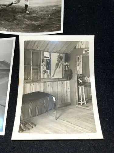 Rustic cabin interior showcasing WW2 Picture Photo Military Baseball Cards collection