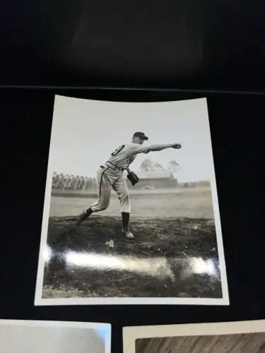 Vintage baseball pitcher in WW2 photo, ideal for collectors of baseball cards and memorabilia