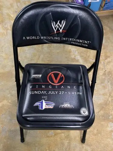 Black WWE folding chair from 2003 Vengeance event, a ringside VIP chair