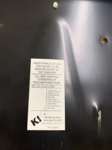 Furniture tag showing polyurethane foam content for WWE Survivor Series Event Ringside VIP Collectors Chair