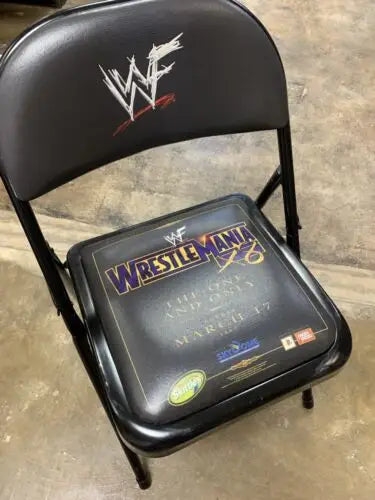 Black VIP Chair with WWF WrestleMania XXVI branding featuring Hulk Hogan design